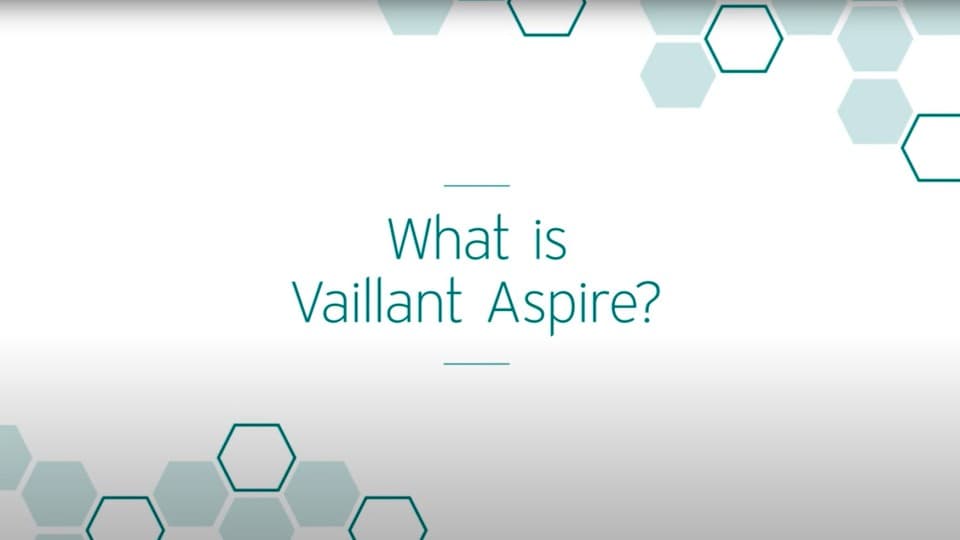 installer fixing the feet at the bottom of the heat pump unit.