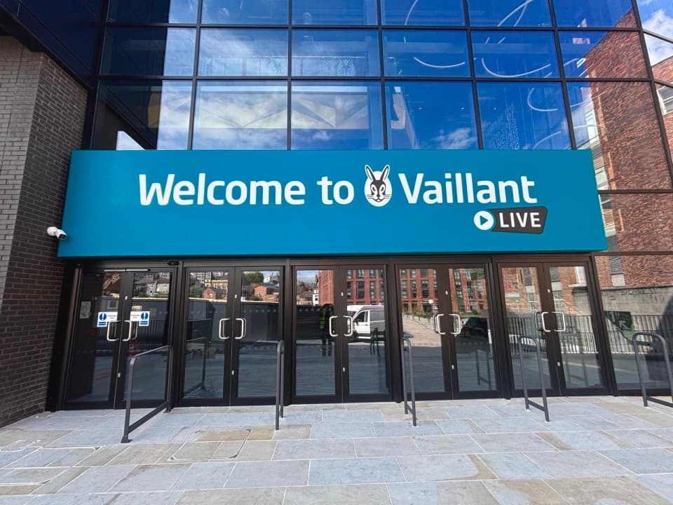 Entrance to Vaillant Live with a row of glass doors.