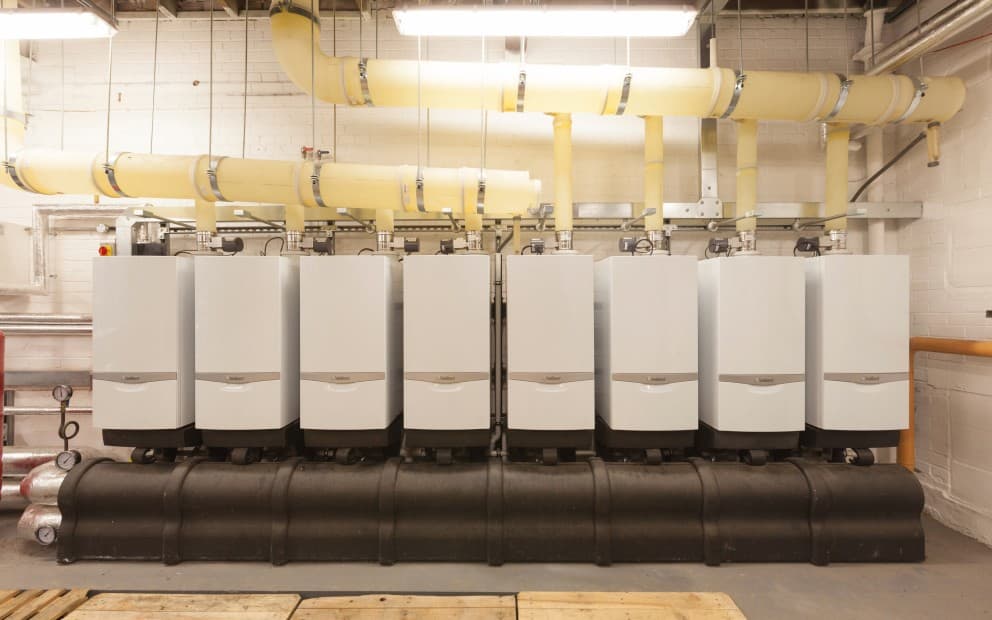 Eights boilers on a cascade in an room