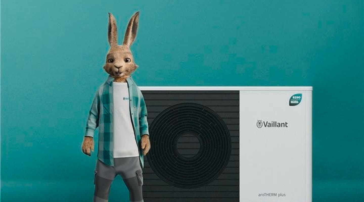 The Vaillant Hare in front of a heat pump.