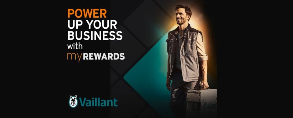 Power your business with myREWARDS. A man is holding a briefcase.